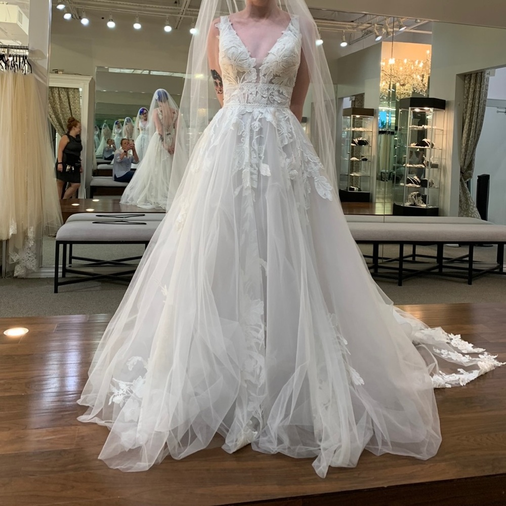 NWT Wilderly Wedding Gown in Ivory. Long train, low button up back.